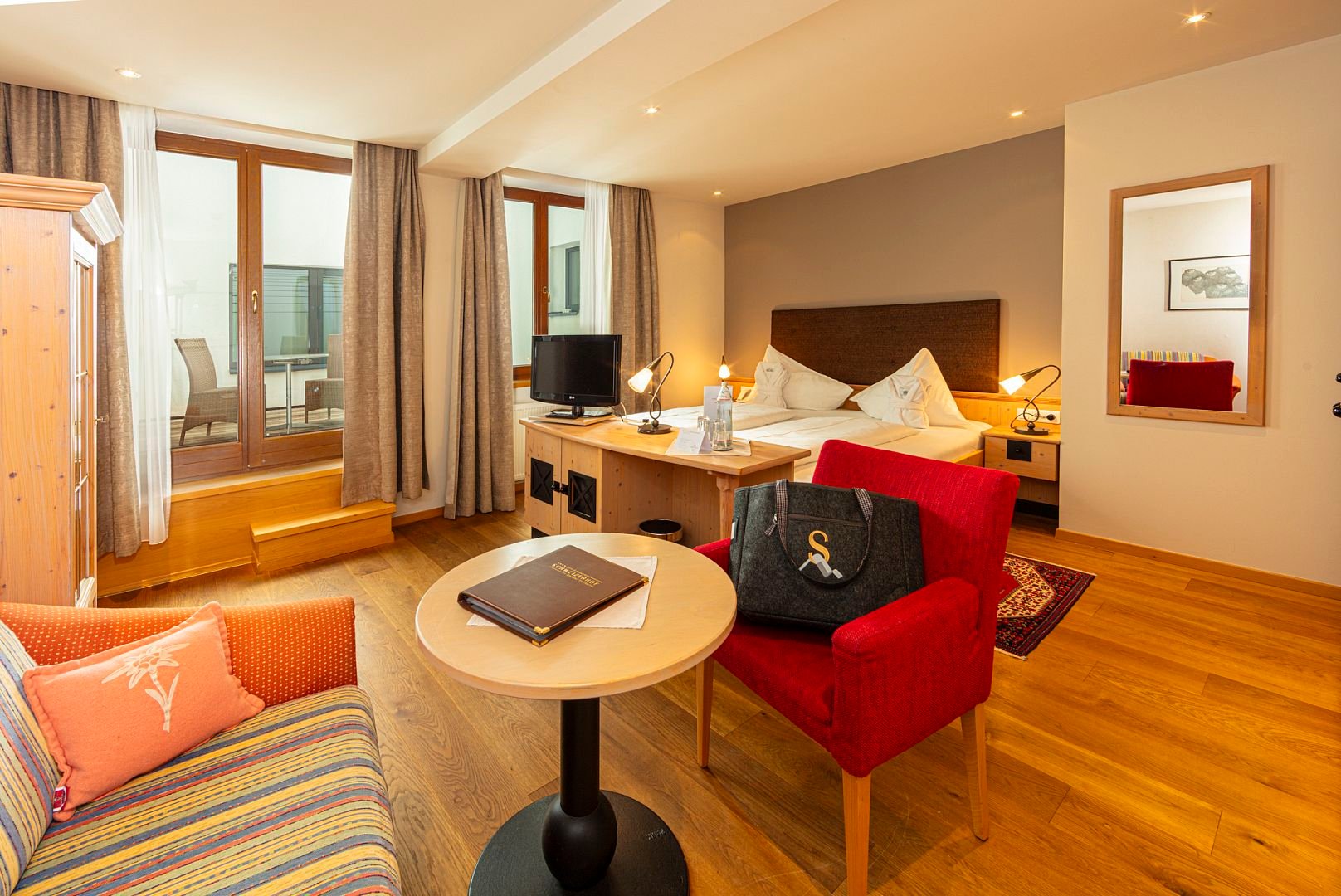 Economy Double Room 'Parterre' - halfboard - Aktivhotel Schweizerhof - Kitzbühel - Kitzbuhel